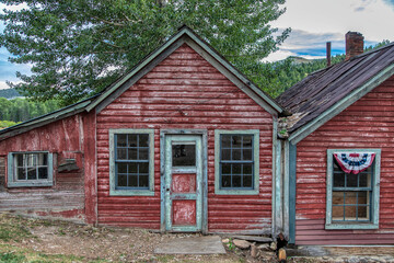 Fototapeta na wymiar old wooden red house
