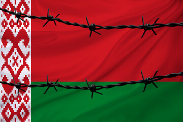national flag of belarus on textured background, rows of barbed wire, concept of war, revolution,...