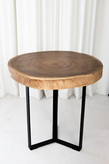 Round coffee table with Live edge wooden top and metal base