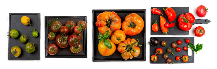 Presentation of old tomatoes in trays and basket.