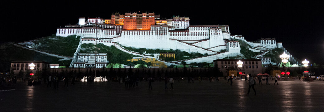 LHASA, TIBET - AUGUST 17, 2018: The Magnificent Potala Palace in Lhasa, home of the Dalai Lama before the Chinese invasion and Unesco World Heritage Site by night