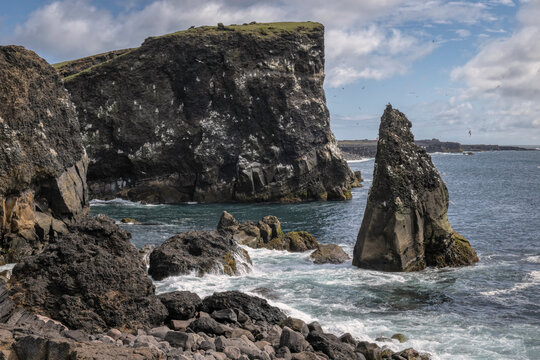 Waves splashing on the sea stacks at Reykjanest&aacute; beach, located in Keflav&iacute;k, Iceland