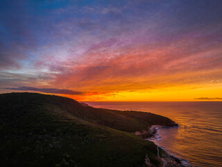 Obraz premium High cloud sunrise over the mountain and sea