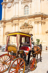 Horse carriage in front of St. Paul Cathedral of Mdina,  Malta