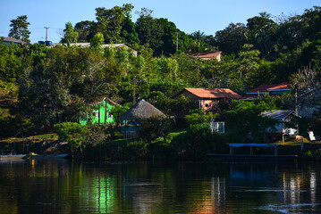 Fototapeta na wymiar The riverside Quilombo of Pedras Negras, a settlement founded mainly by descendants of escaped slaves, on the Guaporé-Itenez river, Rondonia state, Brazil
