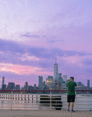 Fototapeta na wymiar city skyline photographer work action New York Manhattan sunrise mornin beautiful sky river views camera 