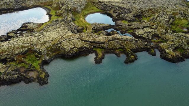 Iceland landscape, beautiful volcanic mountain lake at summer season, pure nature