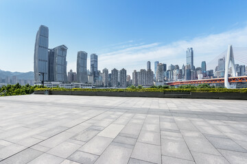 empty square floor with modern city background