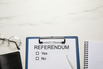 Flat lay composition with referendum ballot on white marble table. Space for text