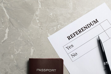 Referendum ballot with pen and passport on light grey marble table, flat lay. Space for text