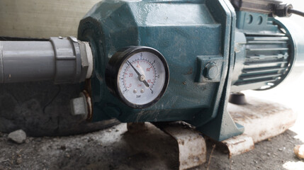 Pressure gauge on the water pressure pump. gauge for measurment water pressure on the pumping.
