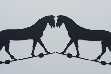 dingbat silhouette cutouts of hobby or trojan horses