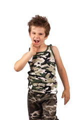 A funny shaggy boy in a colorful khaki T-shirt and shorts is surprised and shouts