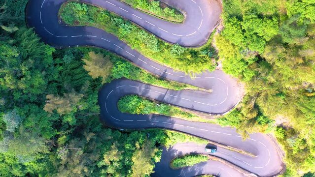 Aerial view of an S-curve road up to Cilaos, Cirque de Cilaos, Reunion Island.