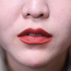 Fototapeta premium Experiment to apply lipstick on human organs. to test before actual use