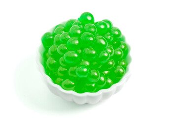 A Bowl Filled with Popping Boba on a White Background