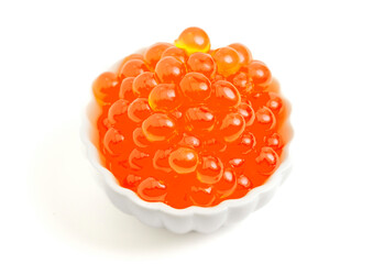 A Bowl Filled with Popping Boba on a White Background