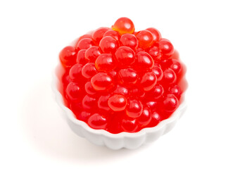 A Bowl Filled with Popping Boba on a White Background - obrazy, fototapety, plakaty