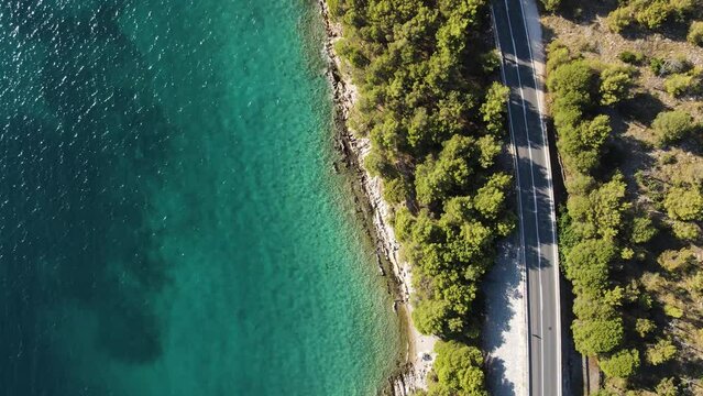 Aerial view of a road driving along the coast near Zadar, Croatia.