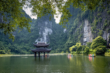 The ancient pagoda is located on the river in Trang An, Ninh Binh province, Vietnam Trang An is a...