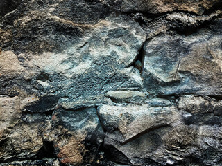 wet castle fortress stones rock formation beach coastline coastal rocks stone boulder dungeon prison defense barrier barricade backdrop nature fence background