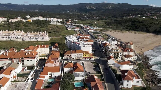 Aerial view of Praia das Macas along south Portuguese coastline facing the Atlantic Ocean, Colares, Portugal.
