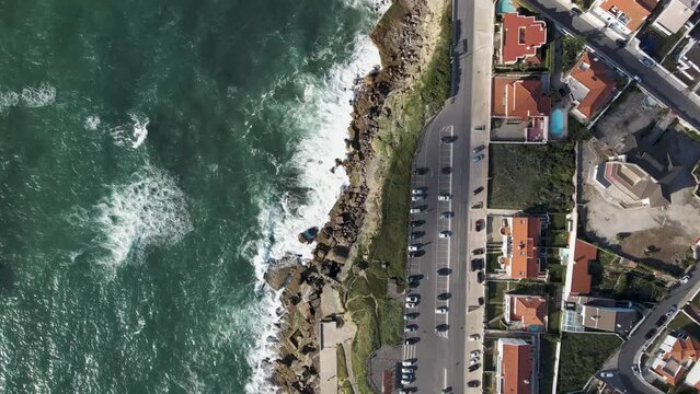 Aerial view of Praia das Macas along south Portuguese coastline facing the Atlantic Ocean, Colares, Portugal.