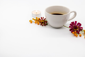 Obraz na płótnie Canvas hot coffee espresso with flowers arrangement flat lay postcard style on background white