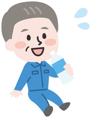 熱中症予防に水を飲む作業員