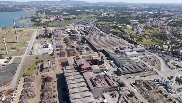 Aerial view of a giant quarry and construction site at Ecometais, a Treatment and recycling plant in Aldeia de Paio Pires industrial area, Setubal, Portugal.