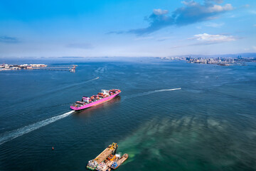 Port terminal freighter and city skyline