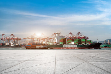 Fototapeta na wymiar Dock cranes loading containers, trade port, shipping