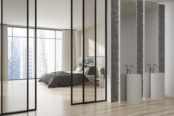Light studio flat interior with sleeping corner and sink, panoramic window