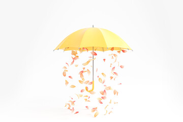 Yellow umbrella and falling leaves on light background