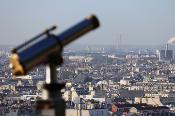 Paris, France - 08.07.2022: View of Paris from the hill of Montmartre, in the foreground the...