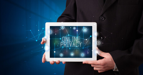 Person holding tablet, security concept