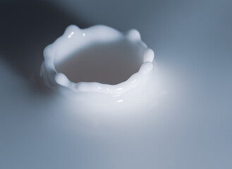 Splash in milk after milk droplet hits the surface