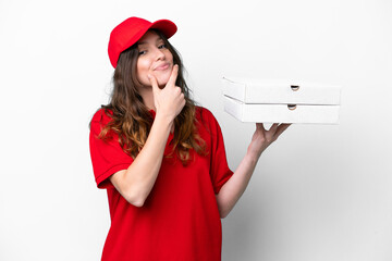 Pizza delivery woman with work uniform picking up pizza boxes isolated on white background happy...