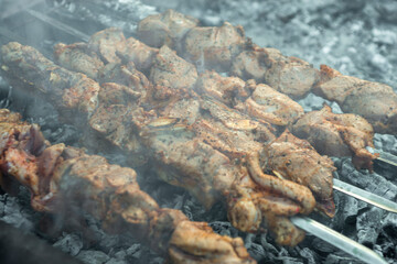Obraz na płótnie Canvas Cooking kebabs on skewers, closeup photo