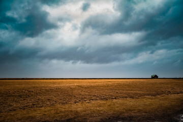 Rural stormy landscape with lonely house in Iceland 