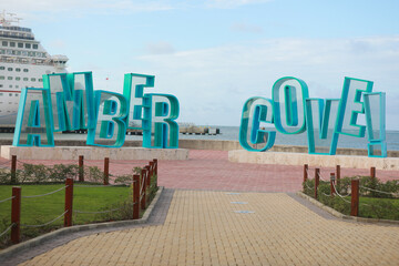 AMBER COVE, PUERTO PLATA, DOMINICAN : CarnivalCruise ship docked at port Amber Cove - obrazy, fototapety, plakaty