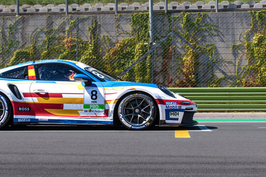 Porsche Carrera Race Car Standing In Racetrack Starting Grid Detail Side View