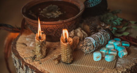 Candle burns on the altar, powerful magic among candles, energy cleaning and wicca concept	
