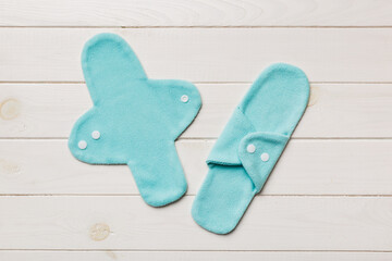 Eco-friendly reusable fabric women's pads. set of colorful bright reusable menstrual pads. zero waste woman periods concept top view with copy space