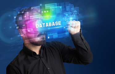 Businessman looking through Virtual Reality glasses