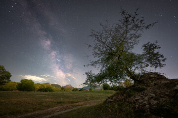 milky way in the countryside. nightscape with de milky way and a landscape