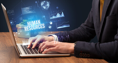 Businessman working on laptop, business concept