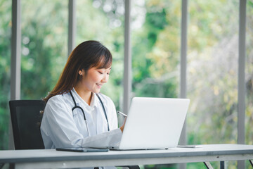 Doctor using online health consulting on computer pc and digital tablet, Tele medical healthcare...