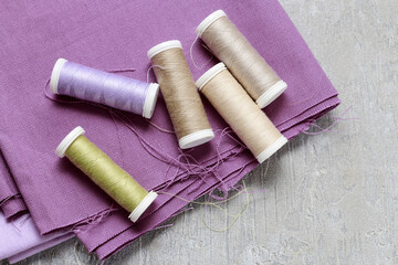 Fototapeta na wymiar Sewing set: fabrics and threads