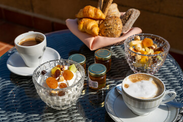 Delicious, hearty and healthy breakfast with coffee and fruit in the hotel room